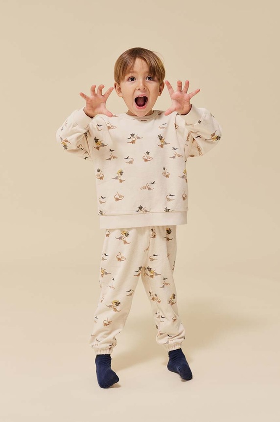 Konges Sløjd spodnie dresowe bawełniane dziecięce nadruk beżowy KS6416