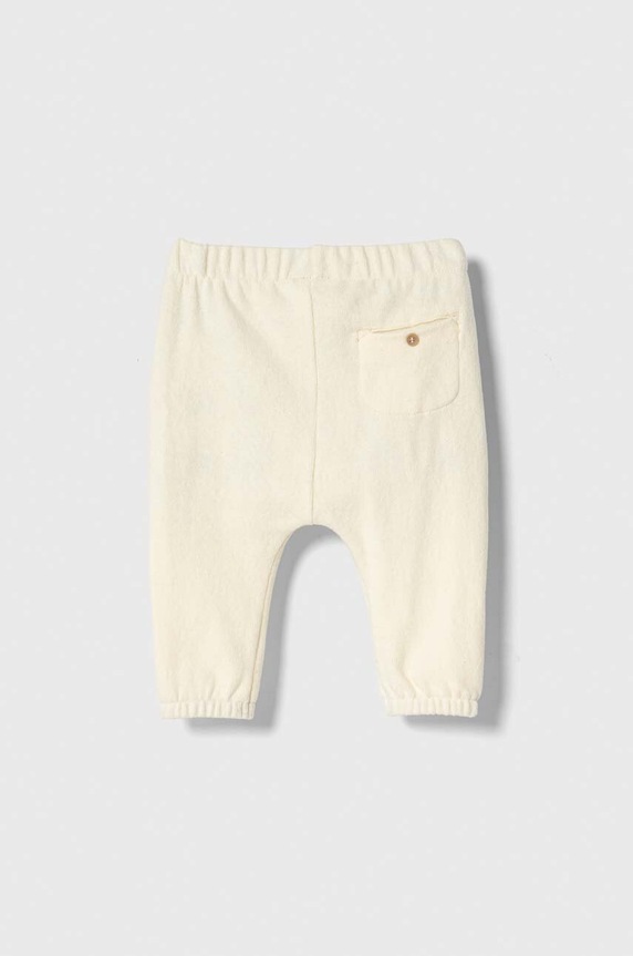 United Colors of Benetton spodnie dresowe niemowlęce 35MWAF01F.W.SEASONAL beżowy AW23
