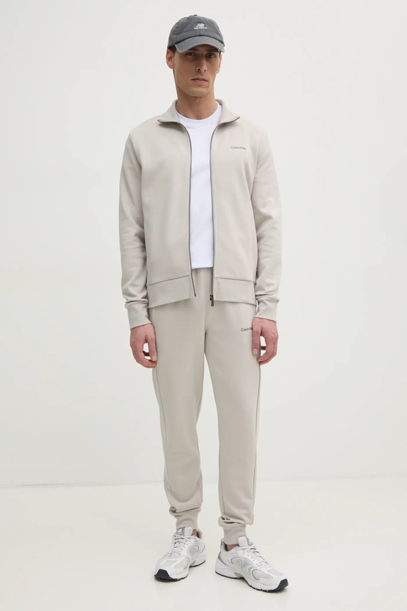 Calvin Klein spodnie dresowe K10K109940 beżowy SS25