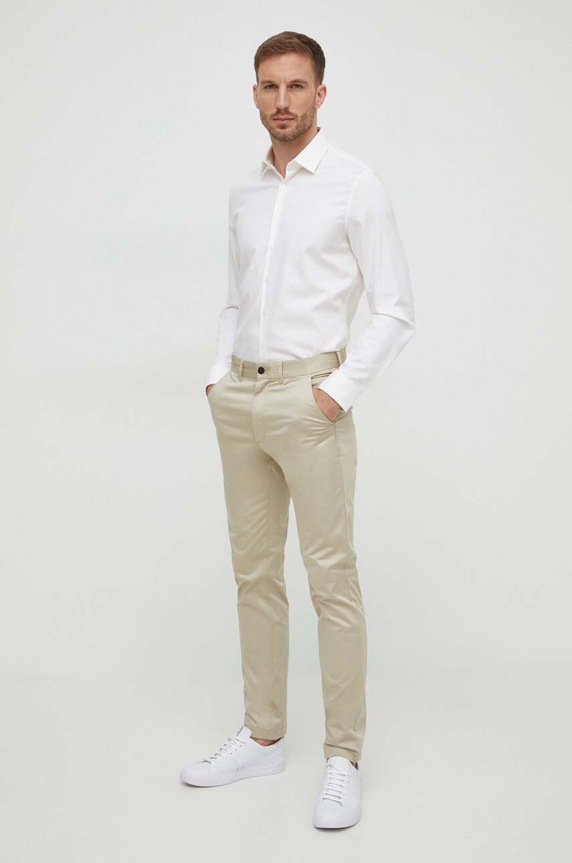Calvin Klein spodnie K10K110963 beżowy AW23