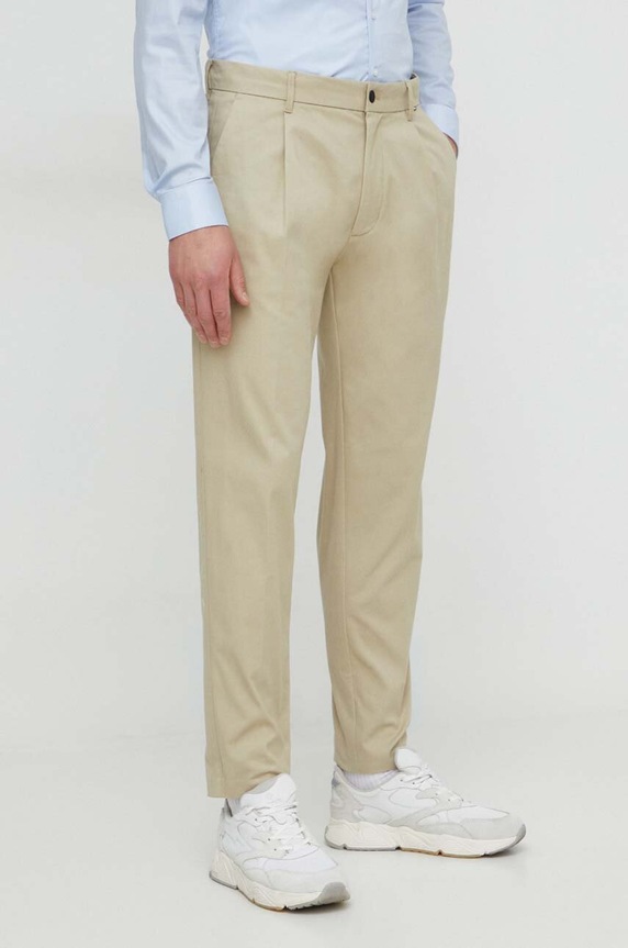 Calvin Klein spodnie z elastanem beżowy K10K111490