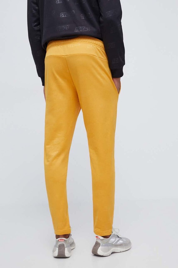 Odzież adidas spodnie dresowe HY1279 żółty