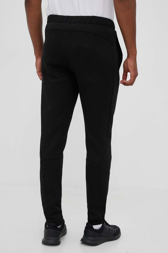 Ruházat Puma edzőnadrág EVOSTRIPE 585814 fekete