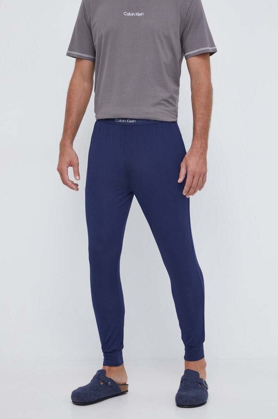 Nohavice Calvin Klein Underwear s elastanom tmavomodrá 000NM2235A