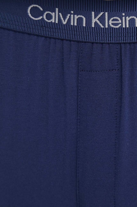 Nohavice Calvin Klein Underwear tmavomodrá 000NM2235A