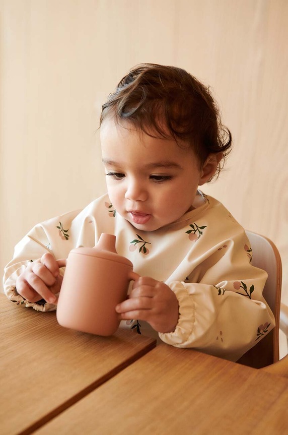 Liewood śliniak dziecięcy Merle Printed Cape Bib beżowy LW14782