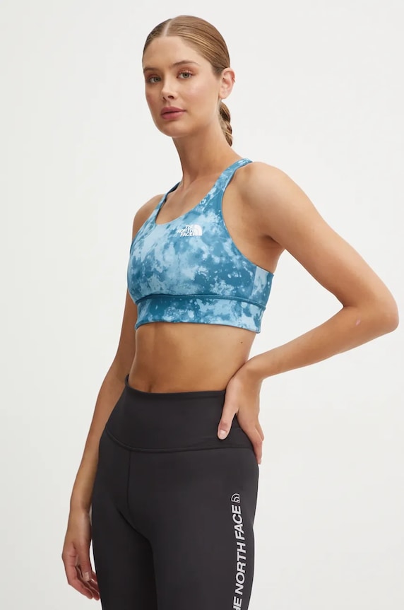 The North Face biustonosz sportowy dwustronny Flex Reversible wzorzyste turkusowy NF0A886Q7OD1
