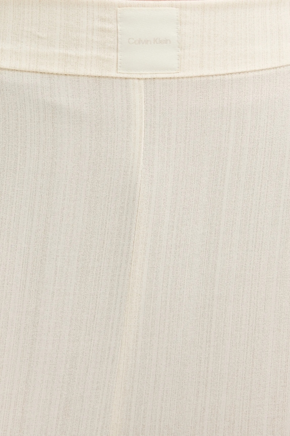 Pyžamové nohavice Calvin Klein Underwear béžová 000QS7257E