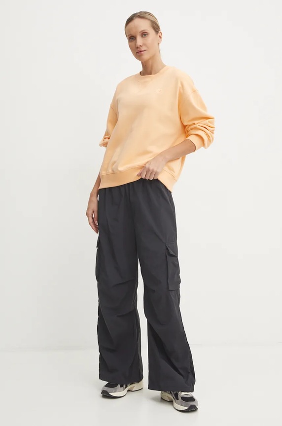 New Balance bluza bawełniana WT41500PAE pomarańczowy AW24