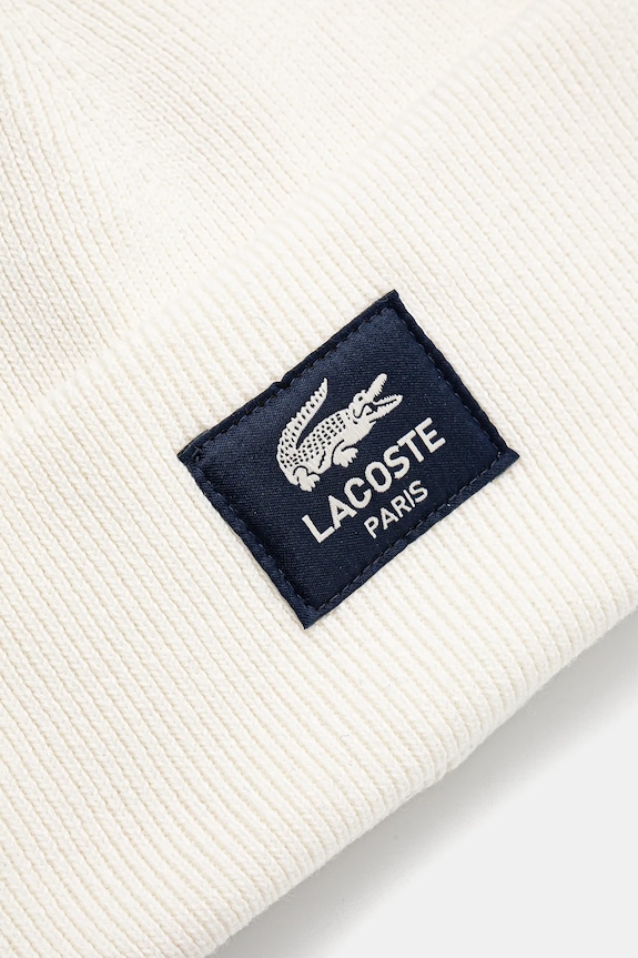Akcesoria Lacoste czapka RB3046 beżowy