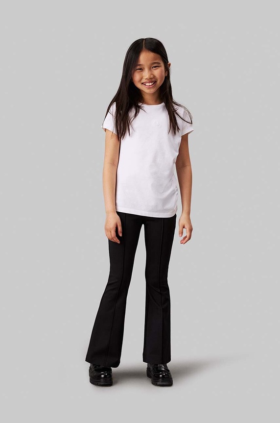 Dětské legíny Calvin Klein Jeans PUNTO TAPE FLARE pletenina černá IG0IG02518.9BYH.104.116