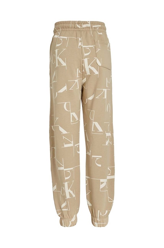 Chłopiec Calvin Klein Jeans spodnie dresowe bawełniane dziecięce TERRY JOGGER IB0IB02124.9BYH beżowy