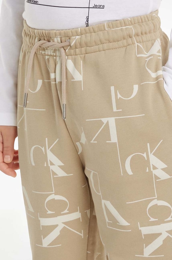 Calvin Klein Jeans spodnie dresowe bawełniane dziecięce TERRY JOGGER IB0IB02124.9BYH beżowy