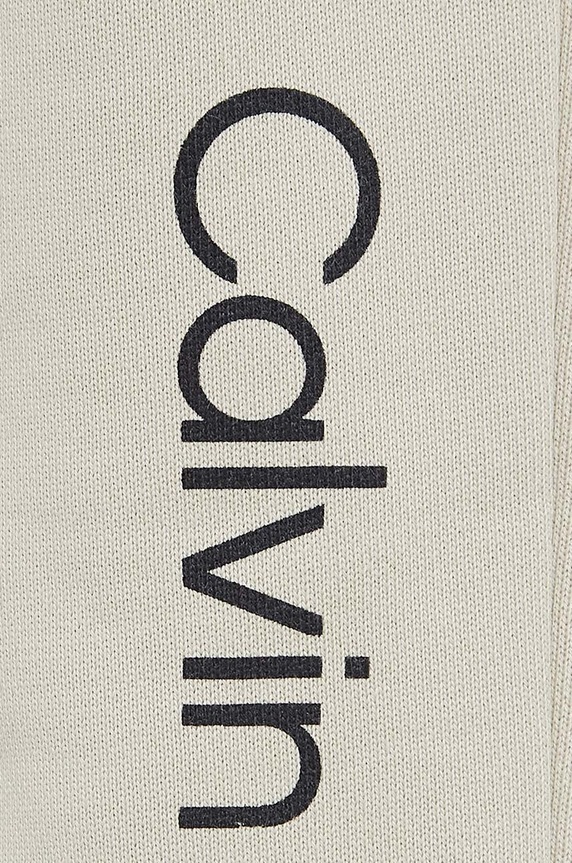 Calvin Klein Jeans spodnie dresowe bawełniane dziecięce REGULAR JOGGER beżowy IU0IU00681.128.176.9BYH