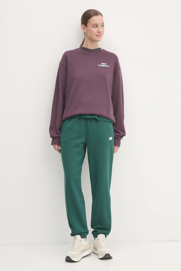 Tepláky New Balance WP41500NWG zelená AW24