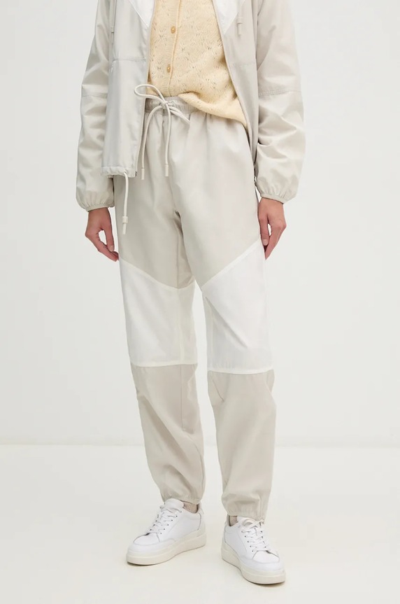 Donji dio trenirke Lacoste tkanina bež XF3248