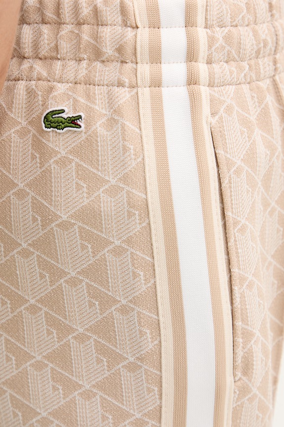 Lacoste Flared trousers Women's beige XF9313