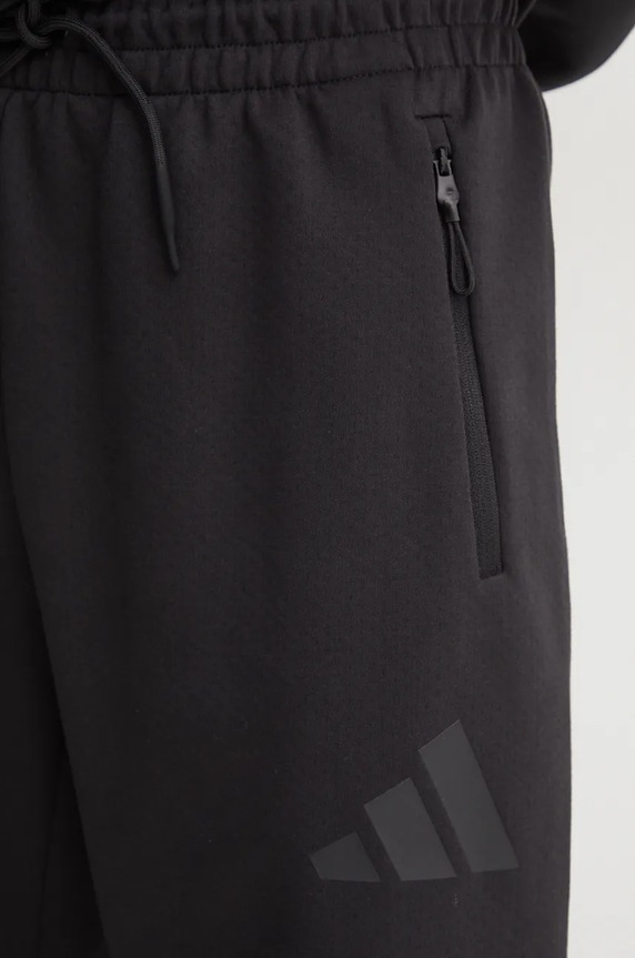 Tepláky adidas ZNE čierna JE7850