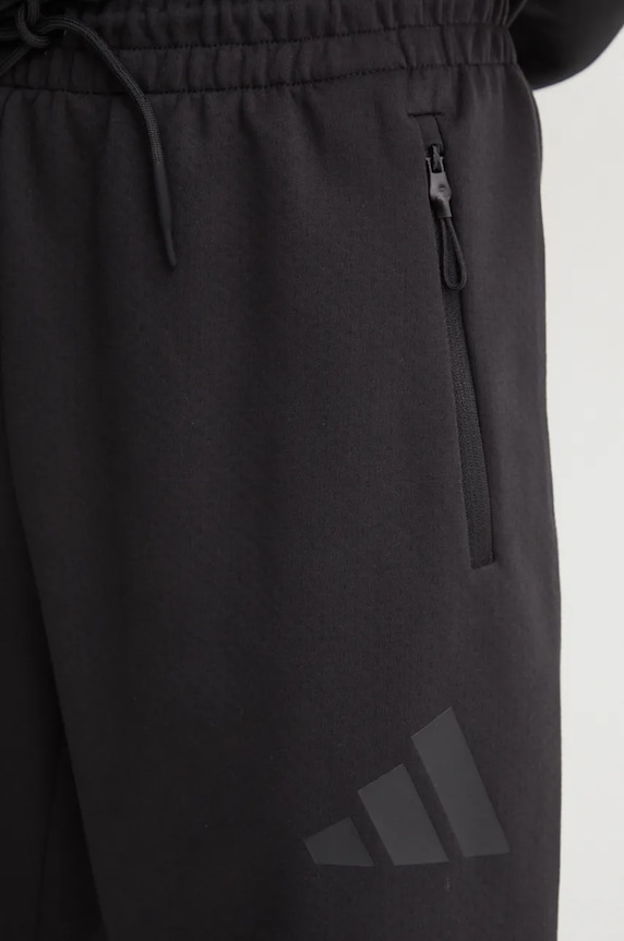 Tepláky adidas ZNE čierna JE7850