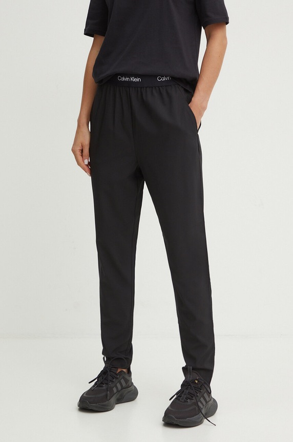 Tréninkové kalhoty Calvin Klein Performance medium černá 00GWS4P601