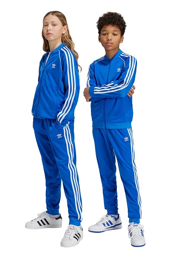adidas Originals spodnie dresowe dziecięce SST TRACK PANTS dzianina niebieski IY4007