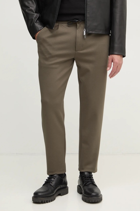 Calvin Klein spodnie z elastanem zielony K10K113648