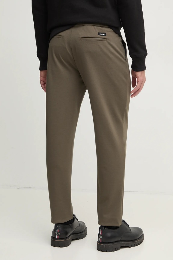 Odzież Calvin Klein spodnie K10K113648 zielony