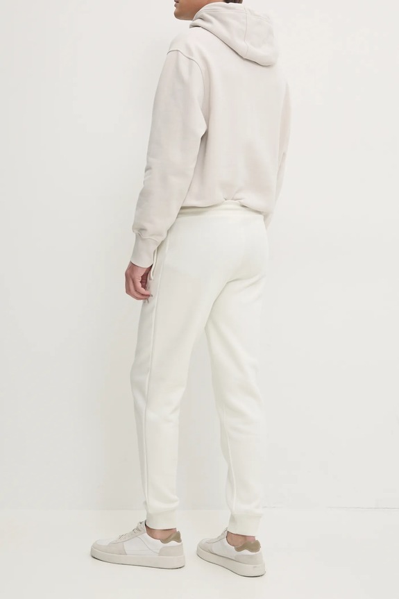 Odzież Calvin Klein Jeans spodnie dresowe J30J325658 beżowy