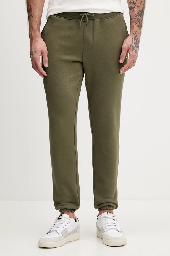 Tommy Jeans pantaloni de trening tricotaj verde DM0DM20473