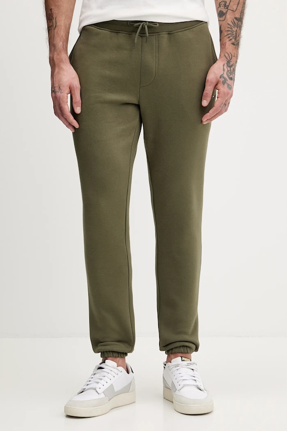 Tommy Jeans pantaloni de trening tricotaj verde DM0DM20473