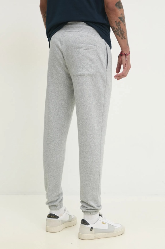 Ρούχα Παντελόνι φόρμας Tommy Jeans DM0DM20473 γκρί