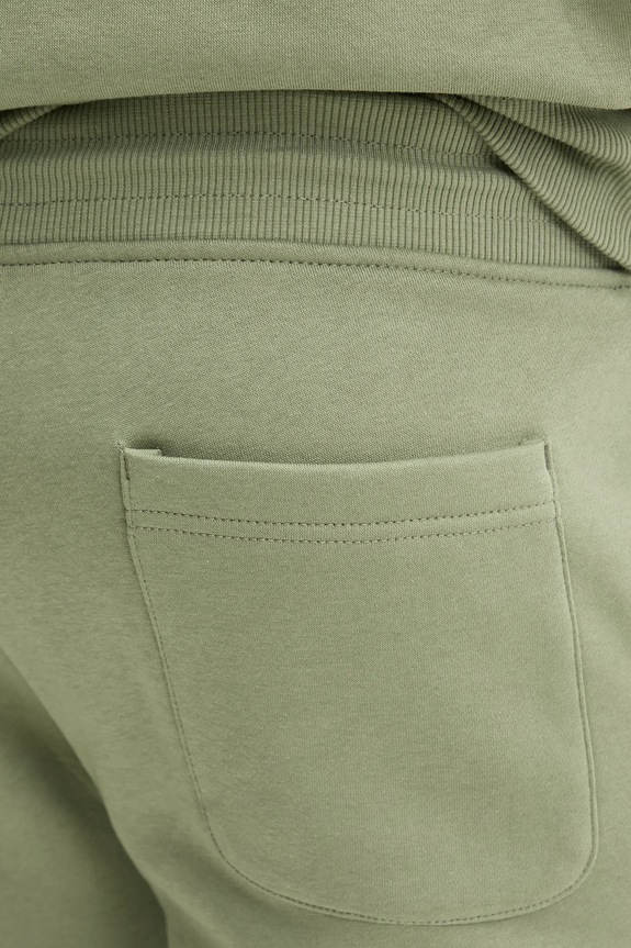 Tommy Jeans spodnie dresowe zielony DM0DM20473