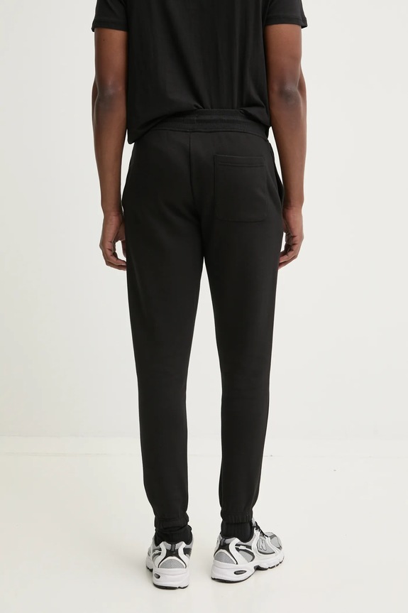 Odzież Tommy Jeans spodnie dresowe DM0DM20473 czarny