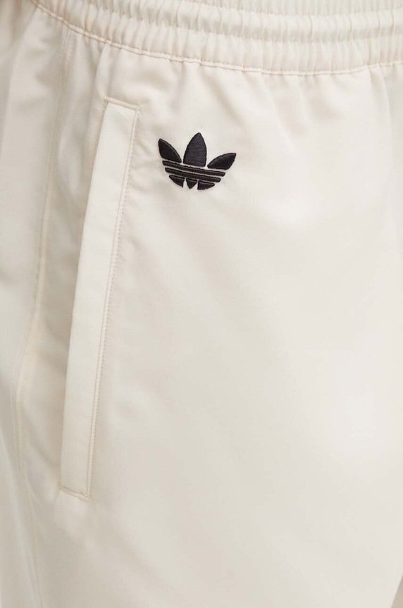 Tepláky adidas Originals béžová JF9158