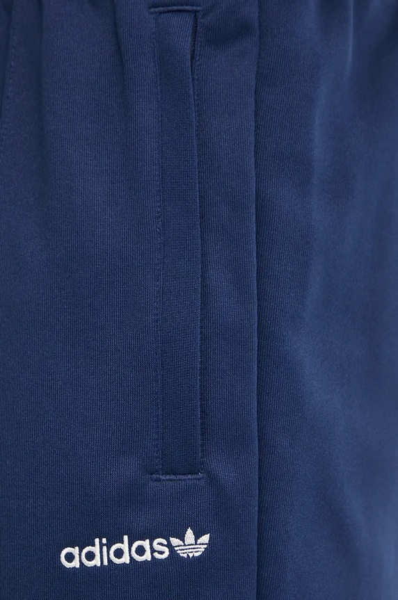 Tepláky adidas Originals tmavomodrá IW3232
