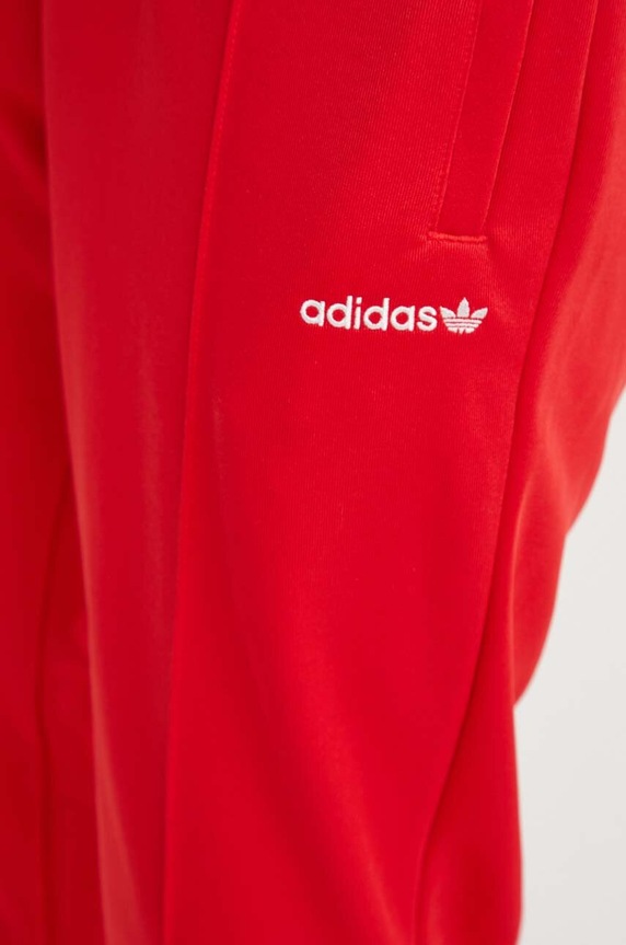 Tepláky adidas Originals červená IX9629