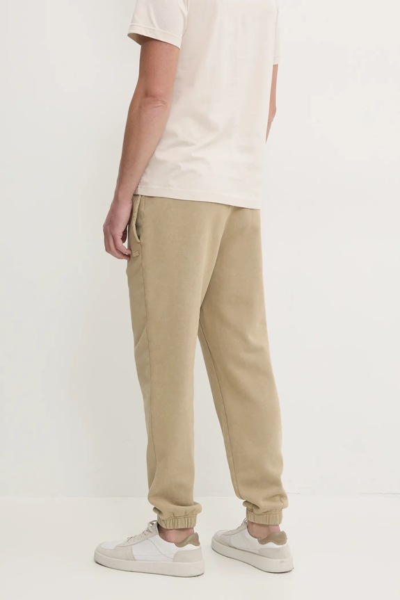 Oblečenie Bavlnené tepláky Lacoste XH2852 béžová