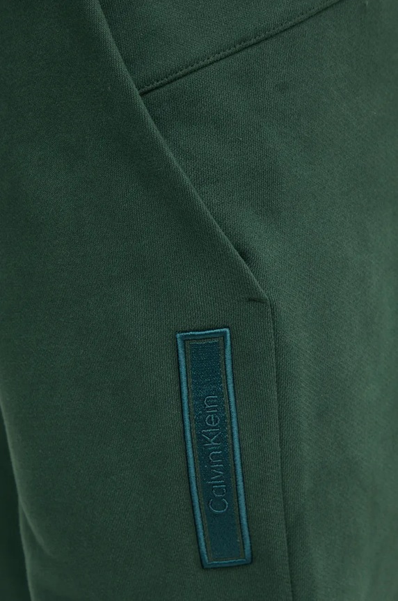 Calvin Klein spodnie dresowe bawełniane zielony K10K113579