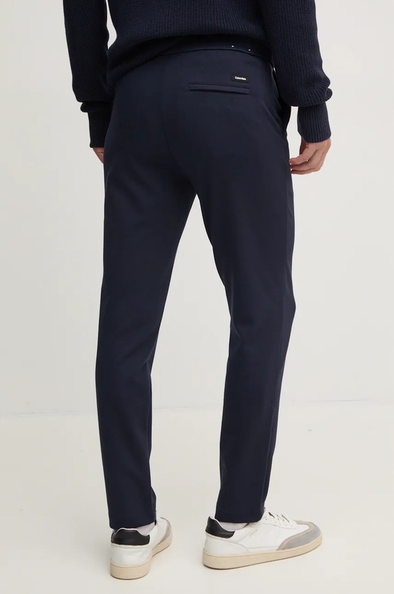 Odzież Calvin Klein spodnie K10K113647 granatowy