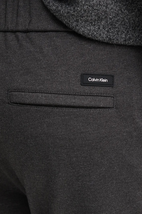 Nohavice Calvin Klein sivá K10K113647
