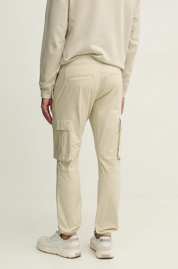 Odzież Calvin Klein Jeans spodnie J30J326438 beżowy