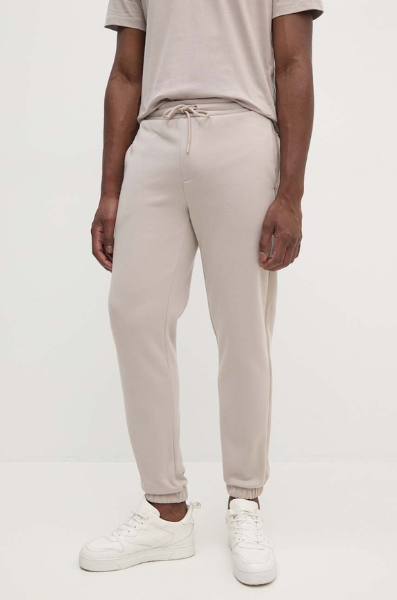 Calvin Klein Jeans spodnie dresowe beżowy J30J326175
