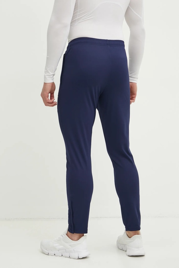 Tréningové nohavice Under Armour Challenger 1382602 tmavomodrá AW24