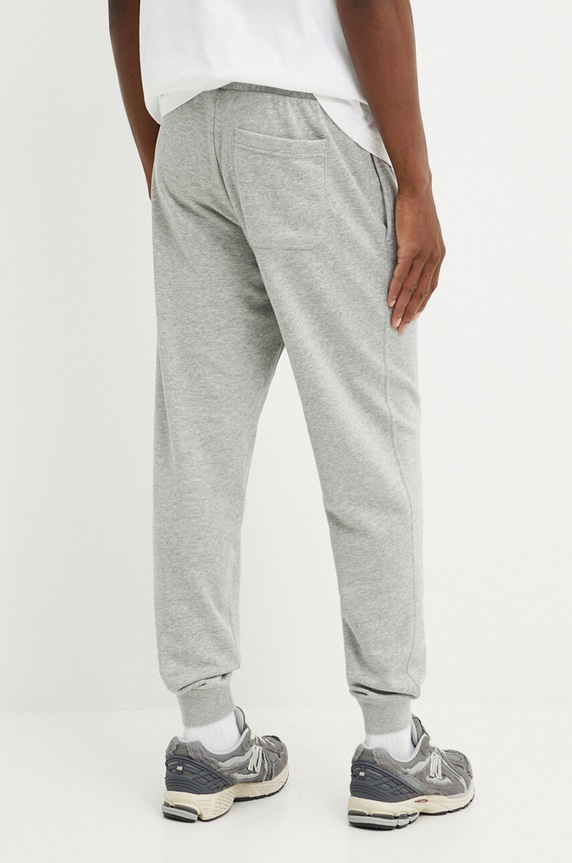 Odzież Converse spodnie dresowe 10026982.A02 szary