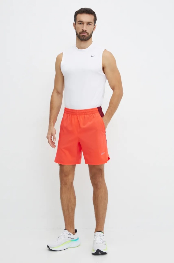 Reebok pantaloni scurti 100206006 portocaliu AW24