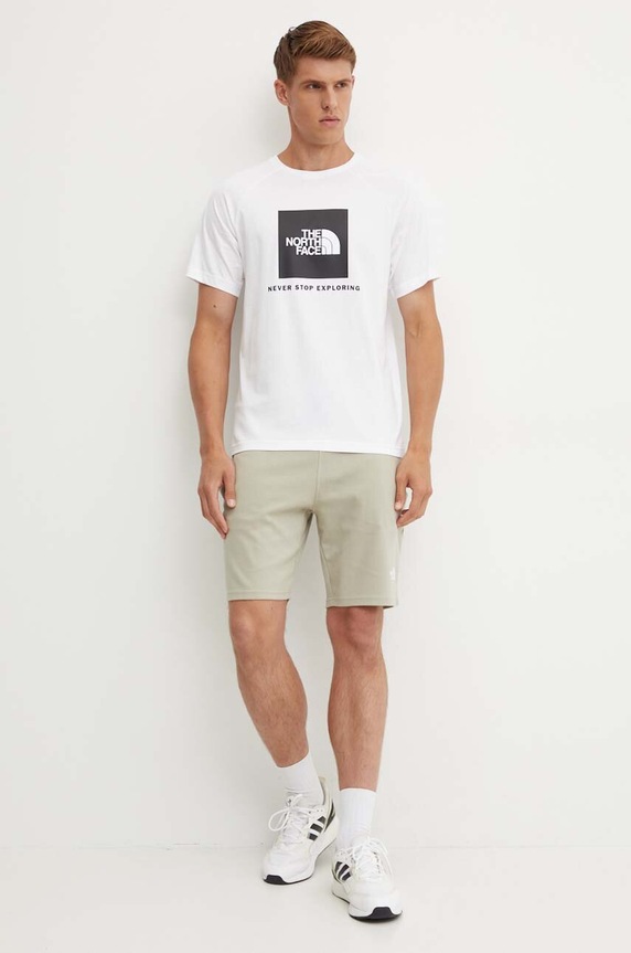 Βαμβακερό μπλουζάκι The North Face S/S Raglan Redbox Tee NF0A87NJFN41 λευκό AW24