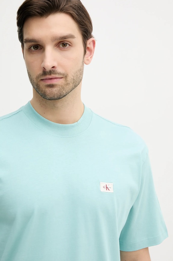 Bombažna kratka majica Calvin Klein Jeans turkizna J30J326857