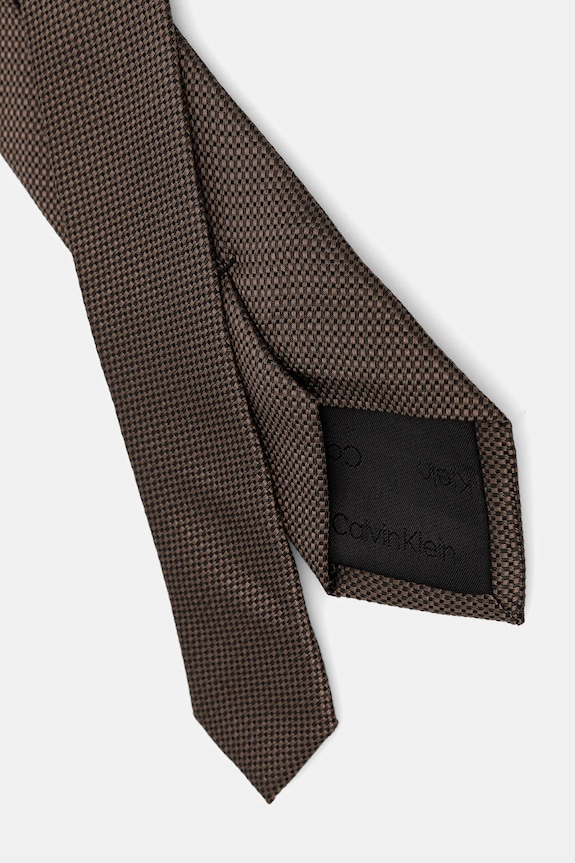 Calvin Klein krawat męski z dodatkiem jedwabiu CK2111E002 brązowy SS26