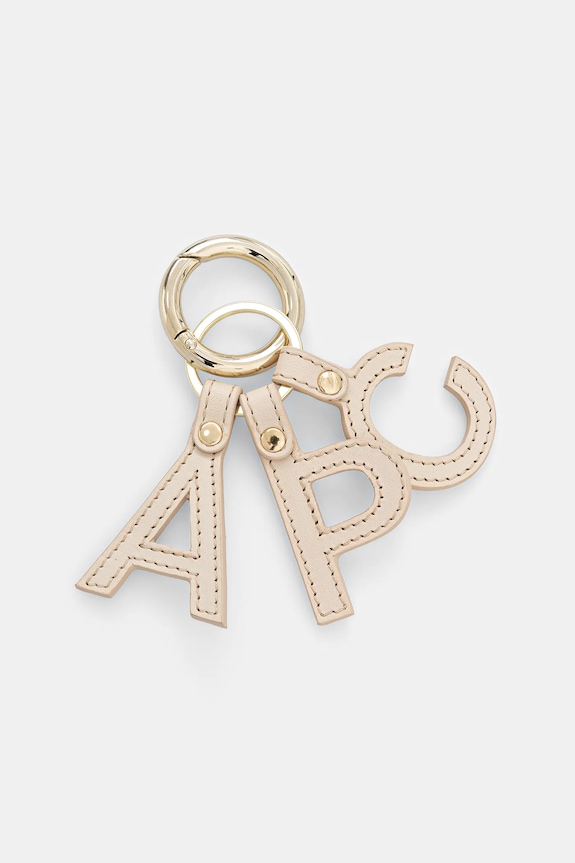 Kožni privjesak A.P.C. porte-cles lettres bež PXAWV.F63656