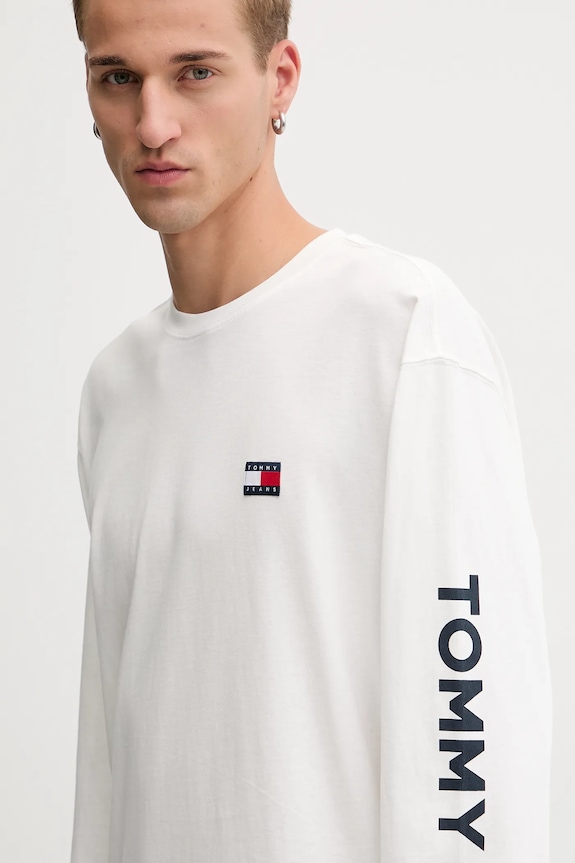 Bavlněné tričko s dlouhým rukávem Tommy Jeans béžová DM0DM21976